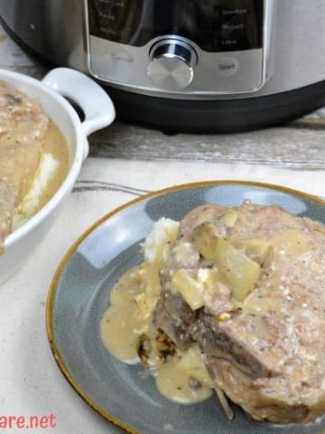 Instant Pot Angel pork chops recipe combines wine, Italian seasonings, onions and mushrooms with cream of mushroom soup and cream cheese for a rich and creamy pork chop recipe. #Instantpot #Porkchops