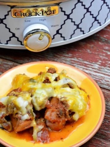 Crock Pot Low Carb Taco Chili Dogs Casserole is a quick meal cooked in a casserole crock pot while your run around to evening activities. #Lowcarb #Keto #CrockPot #Casserole