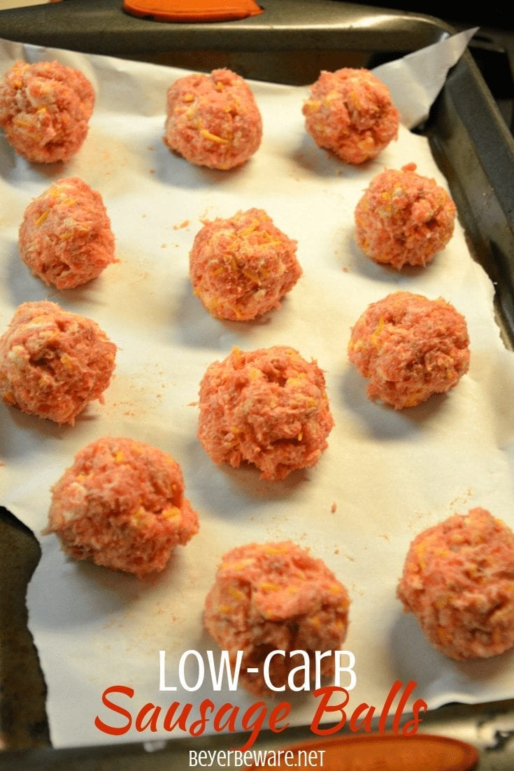 Low-Carb sausage balls use ground pork, cream cheese, parmesan and shredded cheeses to form the base for an oven baked pork meatball. #keto #lowcarb #meatballs #sausage