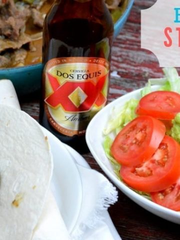 Beer braised steak fajitas are a quick skillet beef fajita recipe thanks to some fajita meet and tenderizing from the beer. #Fajitas #Steak #QuickMeals