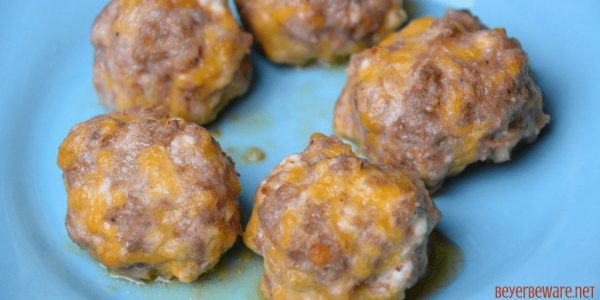 Low-Carb sausage balls use ground pork, cream cheese, parmesan and shredded cheeses to form the base for an oven baked pork meatball. #keto #lowcarb #meatballs #sausage