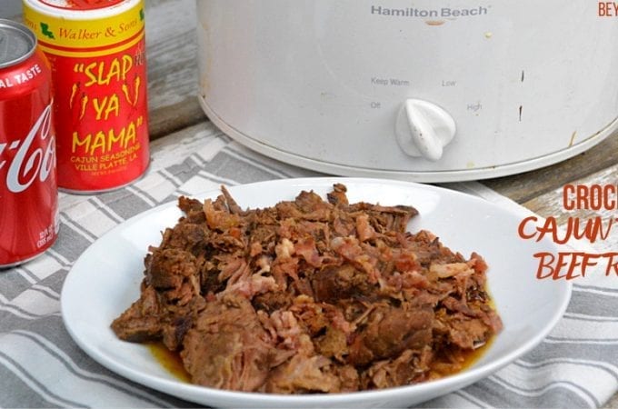 Crock Pot Cajun Bacon Beef Roast is full of Cajun flavors and smokiness from the bacon and bacon grease with tenderness brought on from a can of Coke. #PotRoast #CrockPot #Bacon #CajunRecipes #Beef