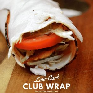 Low Carb club wraps use deli ham and turkey for the outside wrap and filled with cheese, bacon, shredded lettuce, pickles, tomatoes, and ranch to make a gluten-free and keto club rollups. #Keto #lowcarb #GlutenFree #rollups #LowCarbRecipes #KetoRecipes