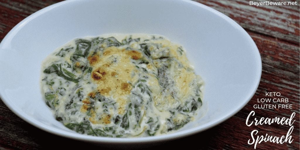 Keto Creamed Spinach is a simple gluten free creamed spinach recipe combining steamed spinach, butter, heavy whipping cream, and mozzarella and parmesan cheeses. #GlutenFree #LowCarb #Keto #SideDishes #Recipes #Keto #Spinach #Cheese