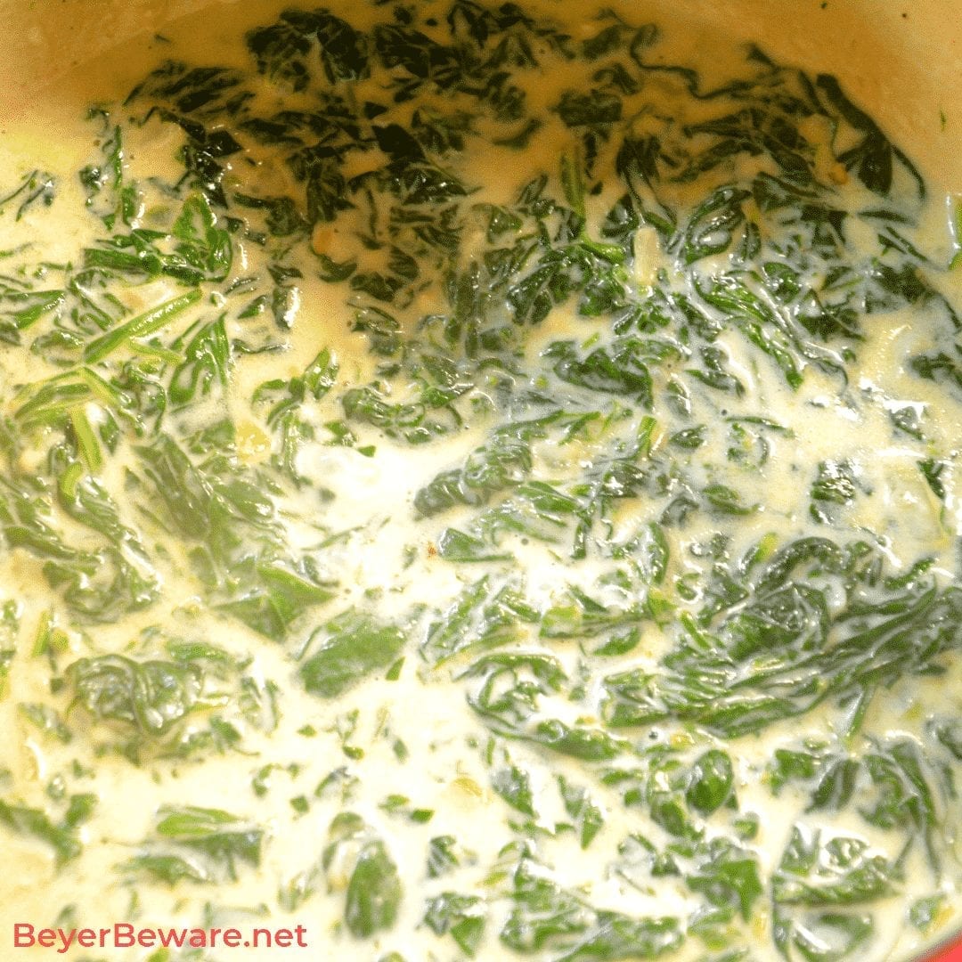 Keto Creamed Spinach is a simple gluten free creamed spinach recipe combining steamed spinach, butter, heavy whipping cream, and mozzarella and parmesan cheeses. #GlutenFree #LowCarb #Keto #SideDishes #Recipes #Keto #Spinach #Cheese