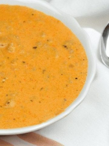 Low Carb Creamy Tomato Sausage Soup is a rich and hearty soup that is gluten free and perfect for low carb diets. For people wanting carbs, you easily can add tortellini to this soup. #lowcarb #Keto #glutenfree #soup #sausage #recipes