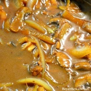 Low Carb One-Pan Salisbury Steak is skillet cooked in butter with onions and mushrooms to set the base of creamy brown gravy to drench the steaks. #lowcarb #keto #Beef #GlutenFree #SalisburySteak #Mushrooms #Recipes