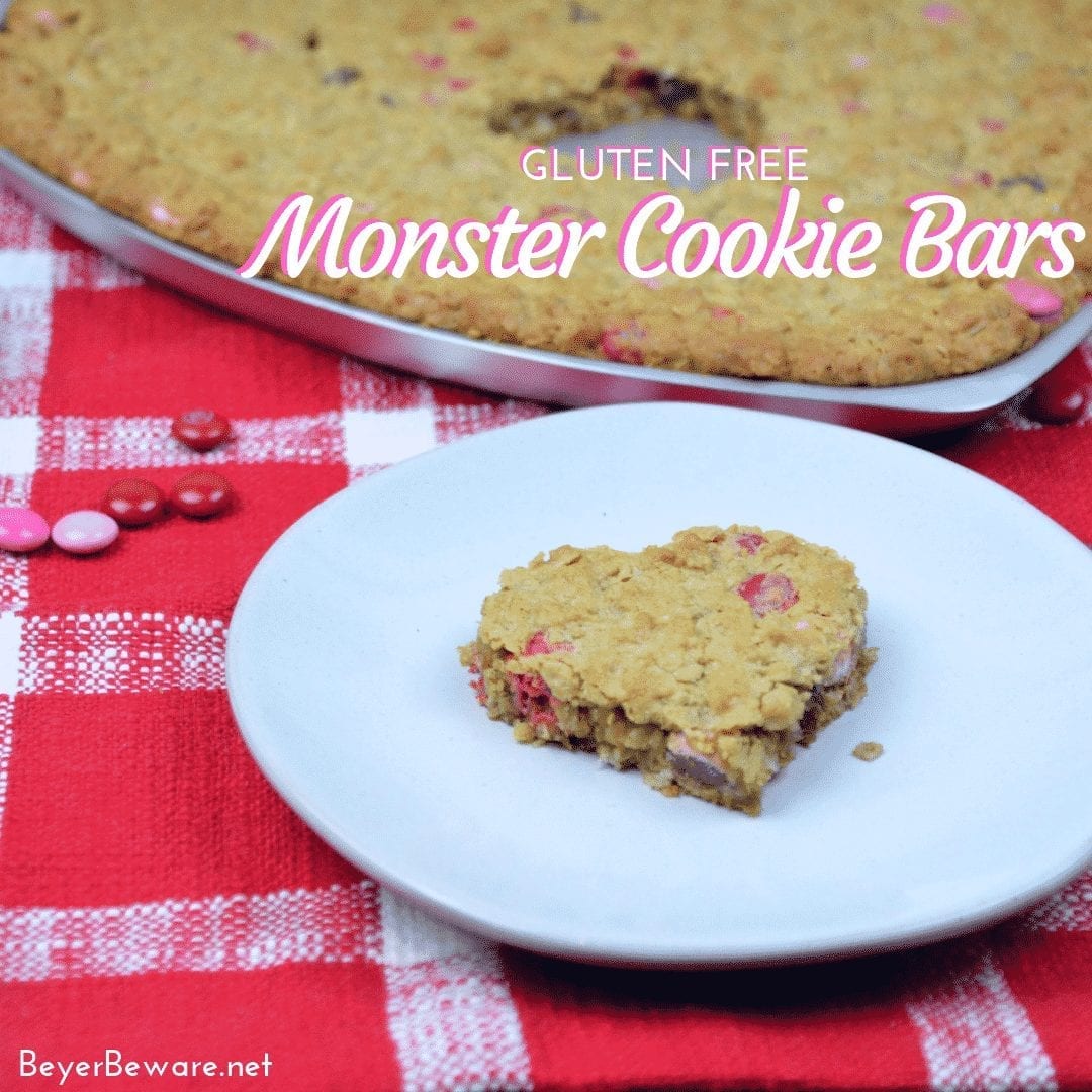 Gluten-Free Monster Cookie bars are a flourless bar cookie recipe combining peanut butter, oats, chocolate chips, and M & Ms to create a chewy chocolate cookie treat. #GlutenFree #Peanutbutter #Chocolate #GlutenFreeDessert #BarCookies