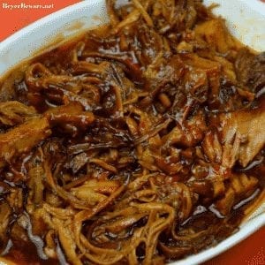 Instant Pot Zesty BBQ Pulled Pork makes a pork shoulder a flavorful and juicing bbq pulled pork with the help of root beer and zesty Italian dressing in 90 minutes. #PulledPork #BBQ #BBQPork #InstantPot #Pork #BBQPork