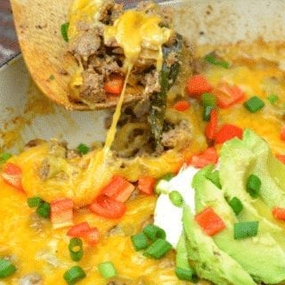 Low-Carb Taco Bake combines the favorite flavors of Mexican food in one pan for a meal that is baked to a flavorful and cheesy keto taco casserole. #LowCarbTaco #LowCarb #Keto #TacoBake #Taco #GroundBeef #MexicanFood