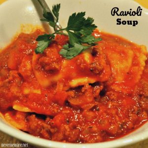 Meaty Tomato Ravioli Soup is a 30-minute meal combing ground beef, canned tomatoes, ravioli and parmesan cheese for a hearty and easy dinner recipe. #soup #Ravioli #EasyDinnerRecipe