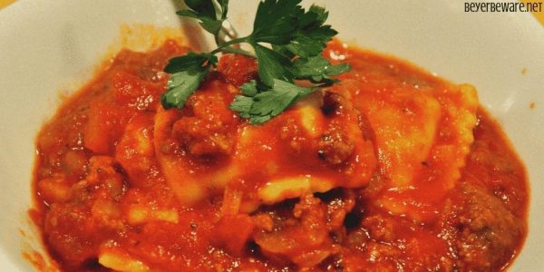 Meaty Tomato Ravioli Soup is a 30-minute meal combing ground beef, canned tomatoes, ravioli and parmesan cheese for a hearty and easy dinner recipe. #soup #Ravioli #EasyDinnerRecipe