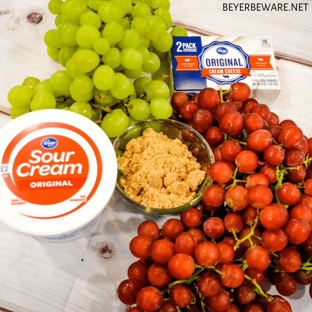Cream cheese grape salad is an easy 5-ingredient fruit salad recipe made with red and green grapes, cream cheese, sour cream, and brown sugar.