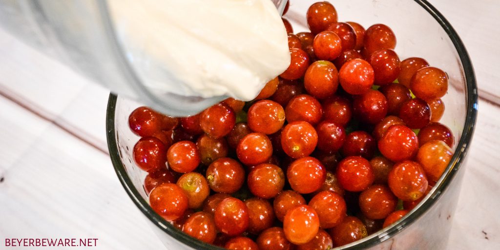 Cream cheese grape salad is an easy 5-ingredient fruit salad recipe made with red and green grapes, cream cheese, sour cream, and brown sugar.