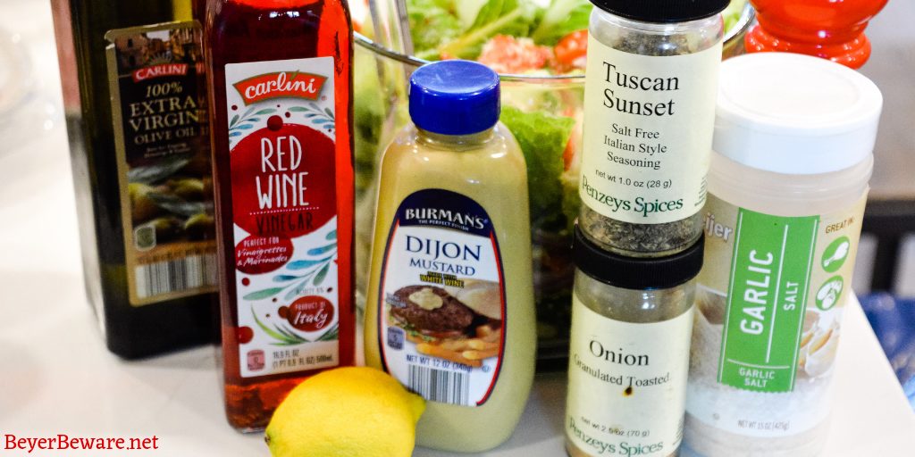 Homemade Italian Salad dressing combines simple tangy red wine vinegar and lemon juice with dijon mustard and olive oil with Italian herbs and seasonings for a simple homemade dressing recipe.