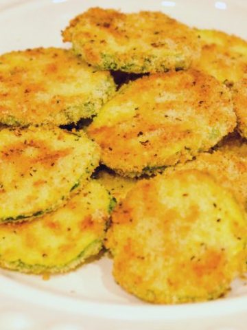 Low-Carb Air Fryer Zucchini Chips are made with sliced zucchini, almond flour, parmesan cheese, steak seasoning and eggs and ready in 10 minutes in the Ninja Foodi or air fryer.