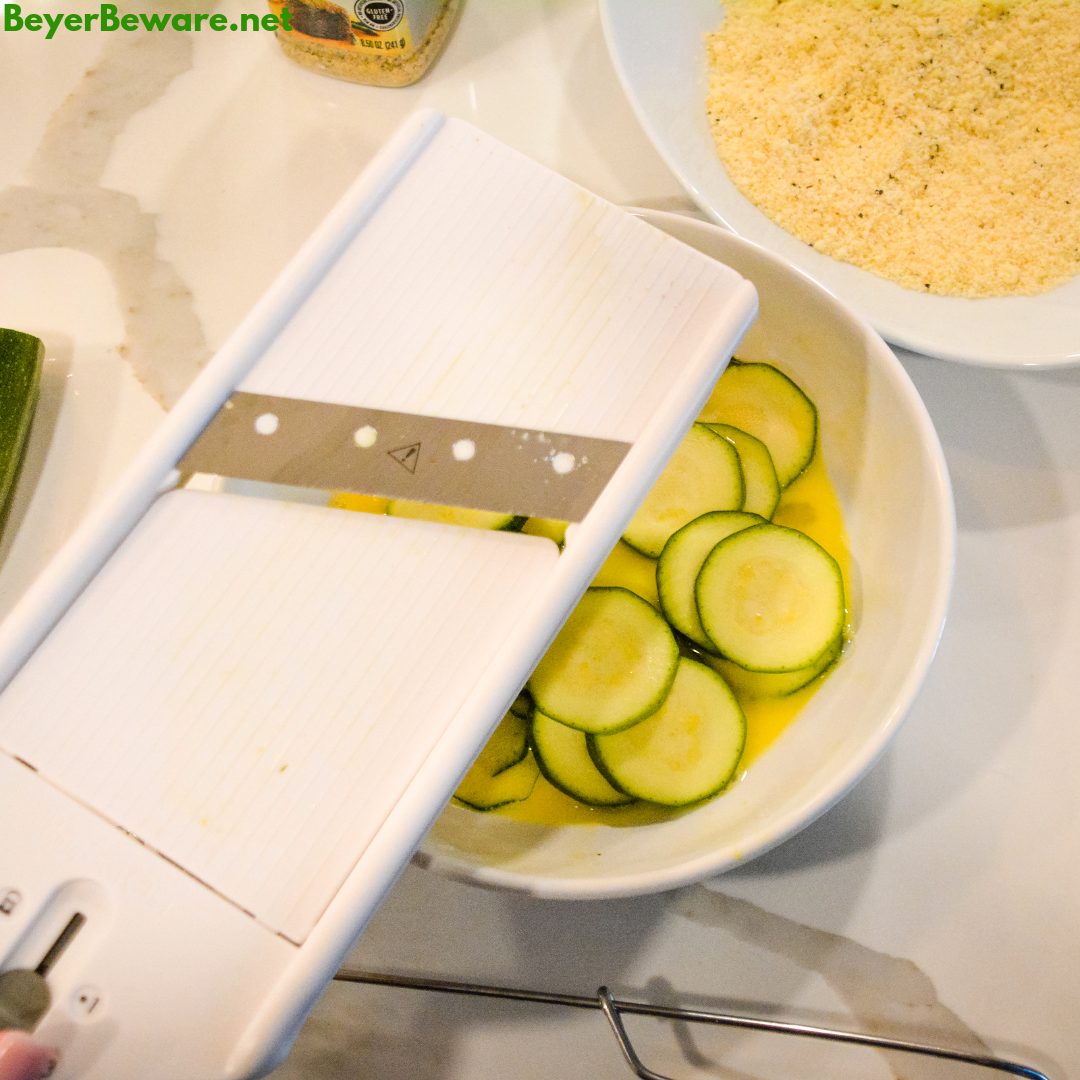 Low-Carb Air Fryer Zucchini Chips are made with sliced zucchini, almond flour, parmesan cheese, steak seasoning and eggs and ready in 10 minutes in the Ninja Foodi or air fryer.