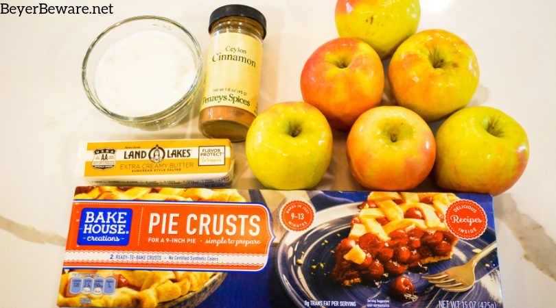 Super Easy 5-Ingredient Apple Dumplings are made with store-bought pie crusts, apples, cinnamon and sugar, butter, and a simple cinnamon and sugar syrup for the easiest apple dumplings recipe ever.