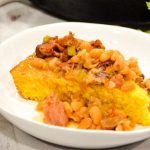 Instant Pot Ham and Beans served over freshly baked cornbread is the ultimate comfort food made in just a fraction of the time compared to a slow cooker.