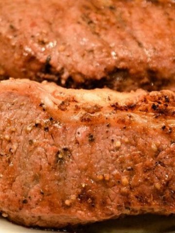 All-American Steaks require two simple ingredients of Italian dressing and Worcestershire sauce to form a marinade that does its job in 30 minutes and ready for a hot grill.