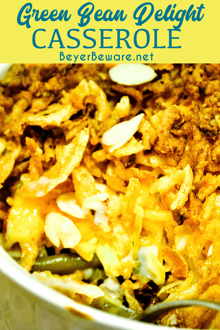 Green bean delight casserole is a dressed-up version of the traditional green bean casserole recipe with the addition of cheese and almonds.