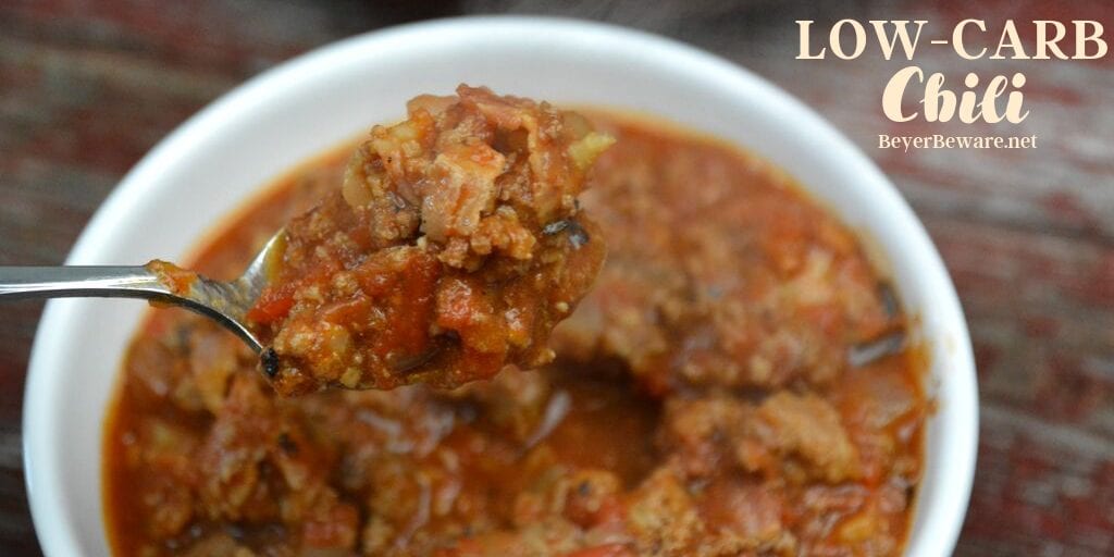 Low-Carb Chili is the perfect combination of flavors with a base of smokey bacon, onions and ground beef that becomes perfection with the addition of tomatoes and chili seasonings. 