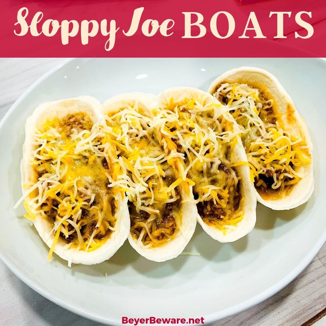 Sloppy Joe Boats is the easy way to eat your sloppy joe recipe without the mess by fill taco boat shells with sloppy joe and topping off with cheese. 