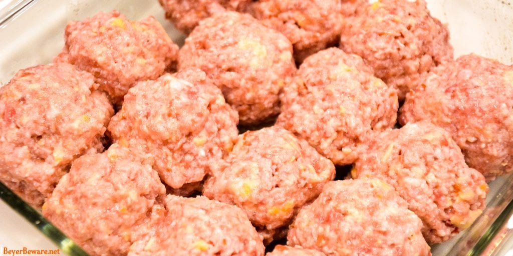Bourbon Glazed Ham Balls are a pork lovers dream with the combination of ground ham and ground pork along with onion, crackers, and egg combine with my pork seasoning and drenched in a sweet bourbon glaze for the best pork meatball around.