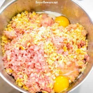 Bourbon Glazed Ham Balls are a pork lovers dream with the combination of ground ham and ground pork along with onion, crackers, and egg combine with my pork seasoning and drenched in a sweet bourbon glaze for the best pork meatball around.