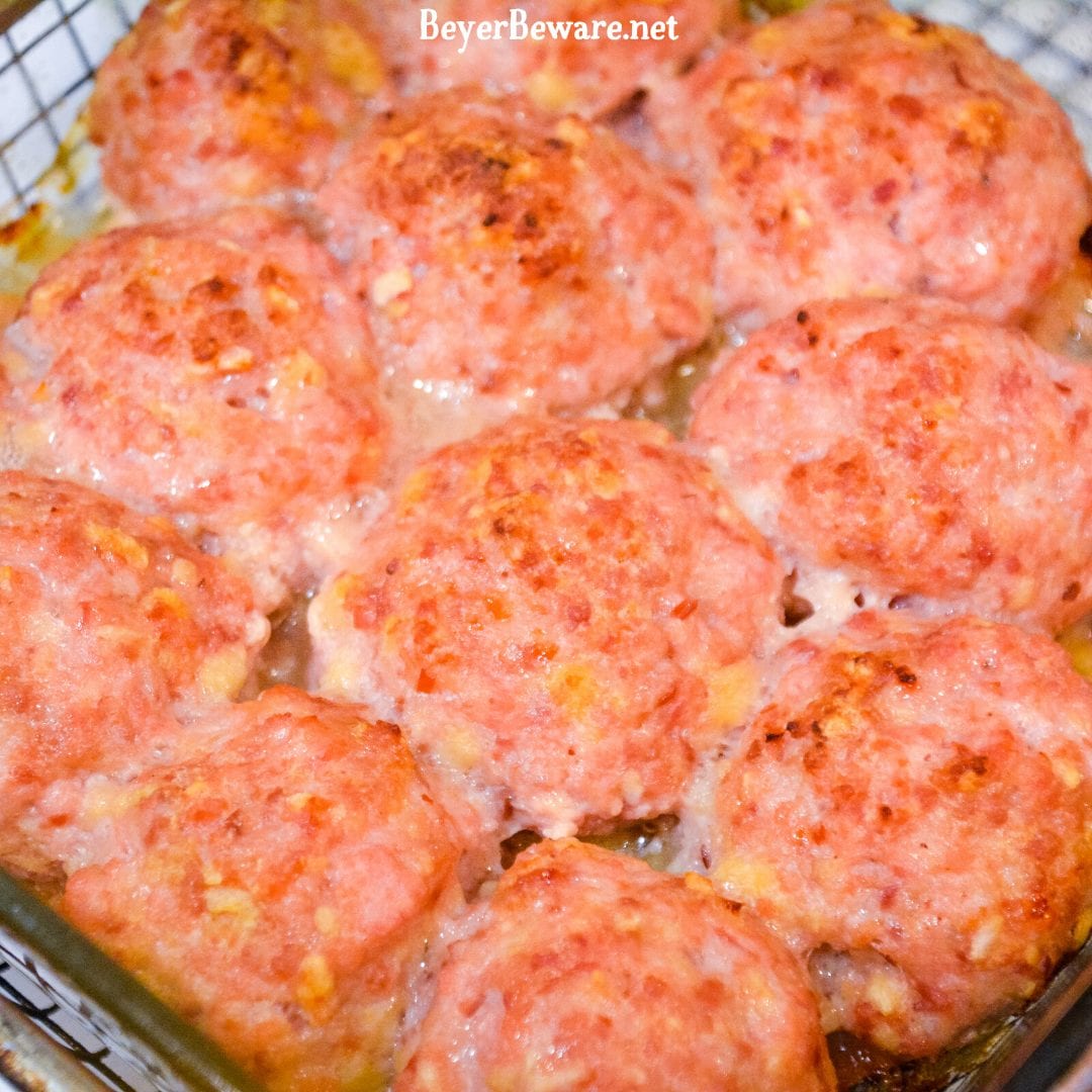 Bourbon Glazed Ham Balls are a pork lovers dream with the combination of ground ham and ground pork along with onion, crackers, and egg combine with my pork seasoning and drenched in a sweet bourbon glaze for the best pork meatball around.
