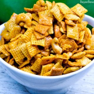 Caramel Cashew Chex Mix is a sweet caramel coated Chex and Golden Graham cereal mix that also includes the buttery and salty addition of cashews.
