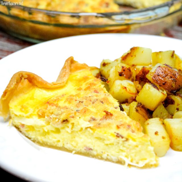 Slice the quiche and serve with a side of country potatoes, fruit, or