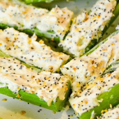 Everything Bagel Stuffed Celery is a low-carb appetizer that combines everything bagel seasoning with cream cheese and then stuffed in celery to make a simple 3-ingredient keto snack.