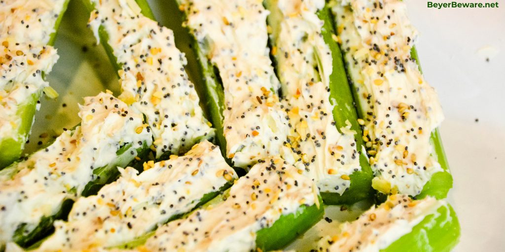 Everything Bagel Stuffed Celery is a low-carb appetizer that combines everything bagel seasoning with cream cheese and then stuffed in celery to make a simple 3-ingredient keto snack.