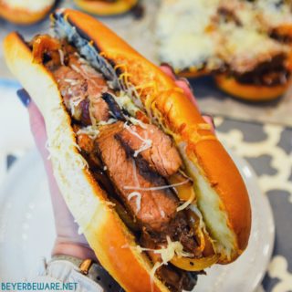 Leftover steak sandwiches uses up cooked steaks to create a midwest version of a Philly Cheesesteak sandwich with caramelized mushrooms, onions and peppers.