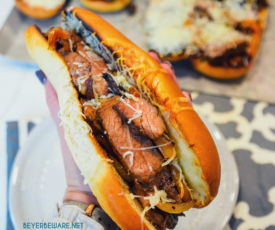 Leftover steak sandwiches uses up cooked steaks to create a midwest version of a Philly Cheesesteak sandwich with caramelized mushrooms, onions and peppers.