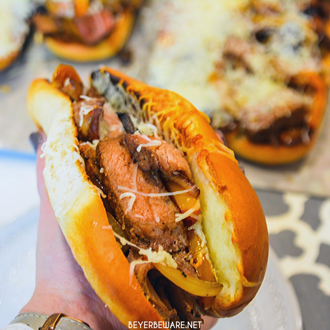 Leftover steak sandwiches use up cooked steaks to create a midwest version of a Philly Cheesesteak sandwich with caramelized mushrooms, onions, and peppers.