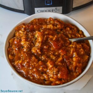 This crock pot taco hamburger and rice soup is a taco-seasoned stuffed pepper soup with a tomato base, rice, bell peppers, onions, and ground beef.