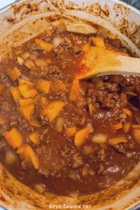 This crock pot taco hamburger and rice soup is a taco-seasoned stuffed pepper soup with a tomato base, rice, bell peppers, onions, and ground beef.