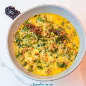 Keto Tuscan sausage soup is a creamy spicy sausage soup with plenty of spinach, sun-dried tomatoes, and spice for an easy and satisfying low-carb soup.