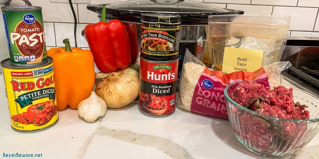 This crock pot taco hamburger and rice soup is a taco-seasoned stuffed pepper soup with a tomato base, rice, bell peppers, onions, and ground beef and slow cooked to a delicious, hearty soup.