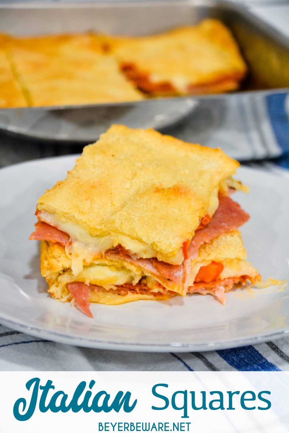 Italian squares are antipasto stuffed crescent rolls that are made with two sheets of a crescent roll dough, ham, salami, pepperoni, pepper rings, and cheese then baked to perfection.