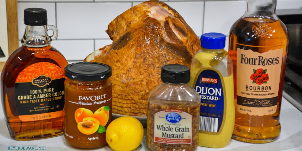 Apricot bourbon-glazed ham on the grill is a sweet and salty combination of flavors with apricot jam, mustard, maple syrup, lemon juice, and bourbon and then smoke drenched on the Big Green Egg.