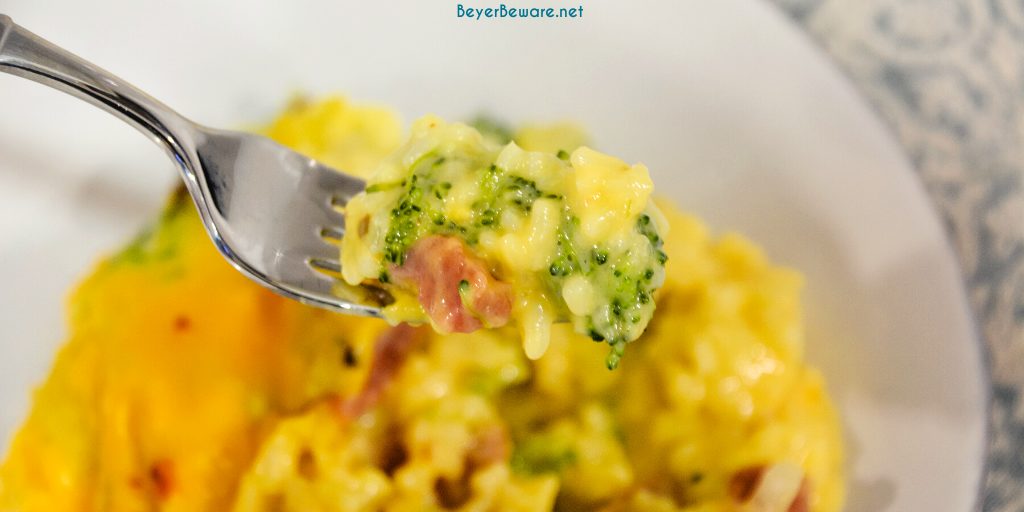 Cheesy ham, broccoli, and rice casserole quickly combined steamed broccoli and cauliflower, diced onions and celery, minute rice, and creamy cheese sauce.