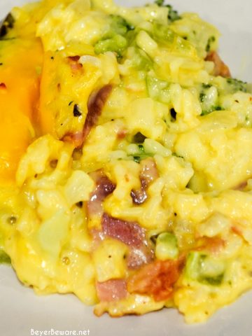 Cheesy ham, broccoli, and rice casserole quickly combined steamed broccoli and cauliflower, diced onions and celery, minute rice, and creamy cheese sauce.