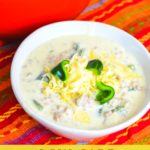 Low-carb chile Rellenos soup is a creamy keto Mexican soup recipe combining queso and cream cheese, ground pork, taco seasonings, and poblano peppers. This is poblano pepper and sausage soup is full of flavors just like your favorite chile Rellenos at your favorite Mexican restaurant.