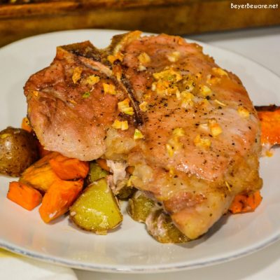 Sheet pan pork chops, sweet potatoes, and red potatoes are a garlic brown sugar pork chops recipe baked on top of roasted sweet potatoes and red potatoes.