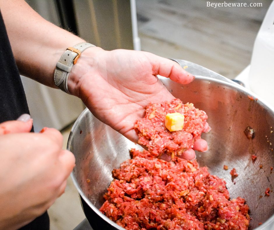 Making cheese stuffed meatballs