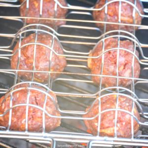 Bacon cheeseburger stuffed meatballs on the grill