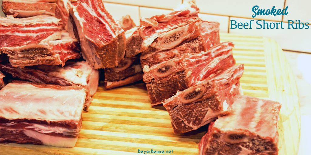 Grilled beef short ribs on the Big Green Egg are smoked with a beef barbecue rub and then slow-cooked to their final temperature in a bath of red wine, butter, and beef broth. 